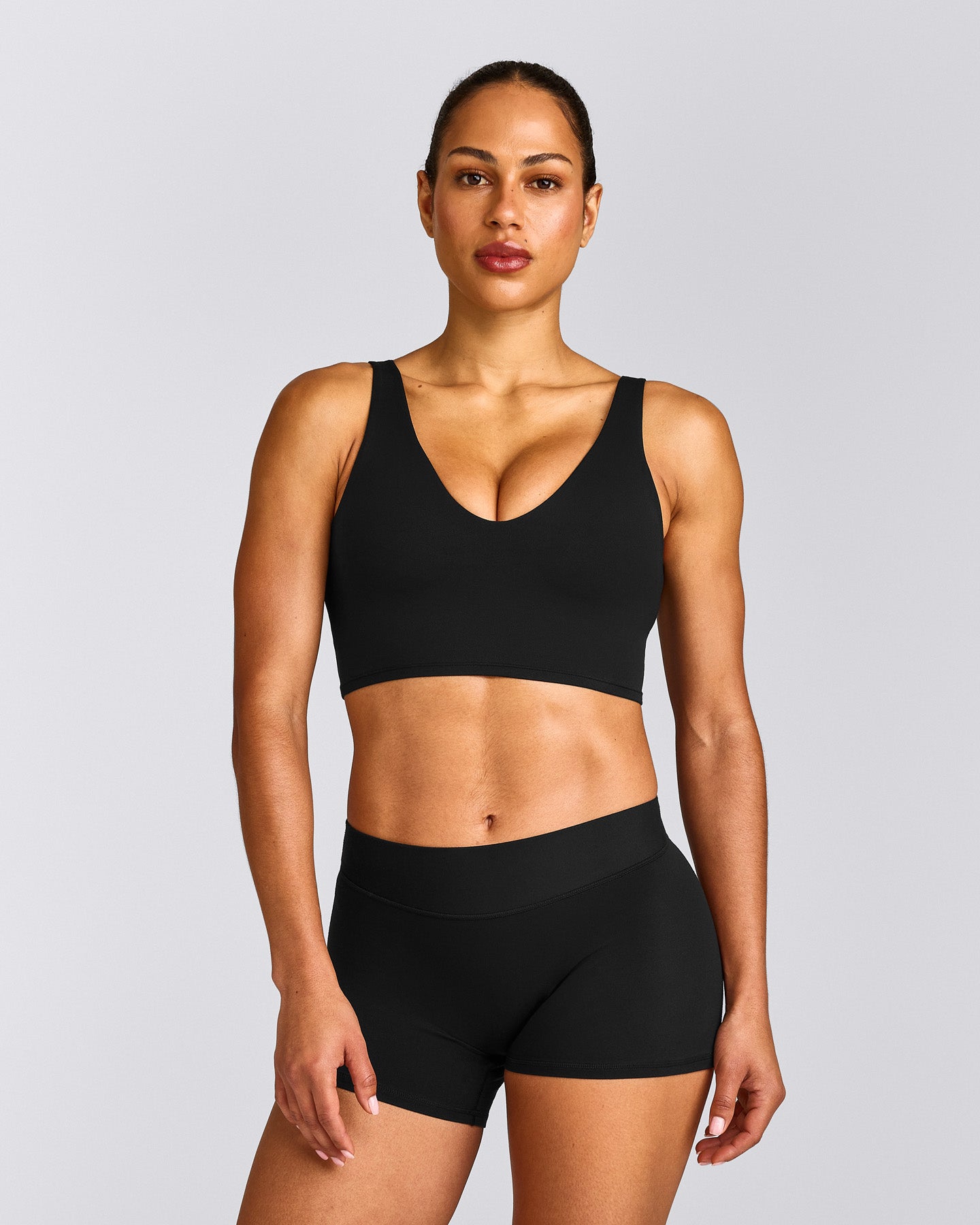 SoftMotion™ Longline Sports Bra with Gray Logo | Black