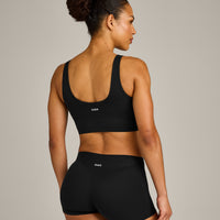 SoftMotion™ Longline Sports Bra with Gray Logo | Black