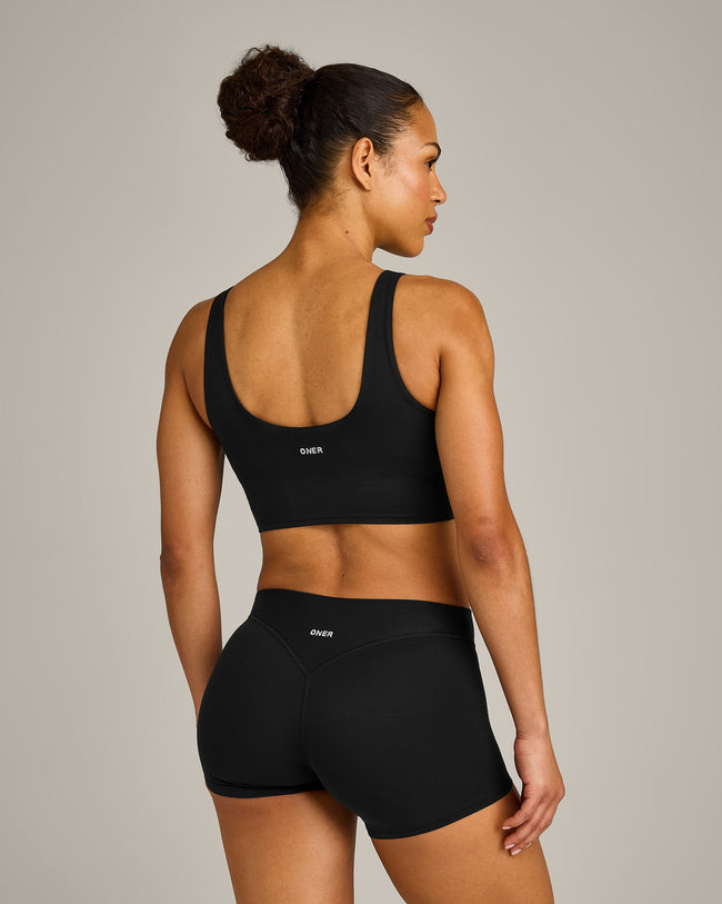 SoftMotion™ Longline Sports Bra with Gray Logo | Black
