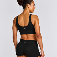 SoftMotion™ Longline Sports Bra with Gray Logo | Black