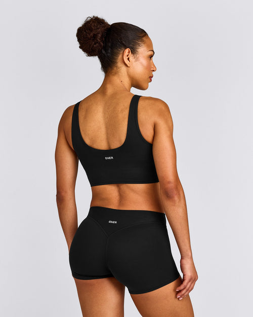 SoftMotion™ Longline Sports Bra with Gray Logo | Black