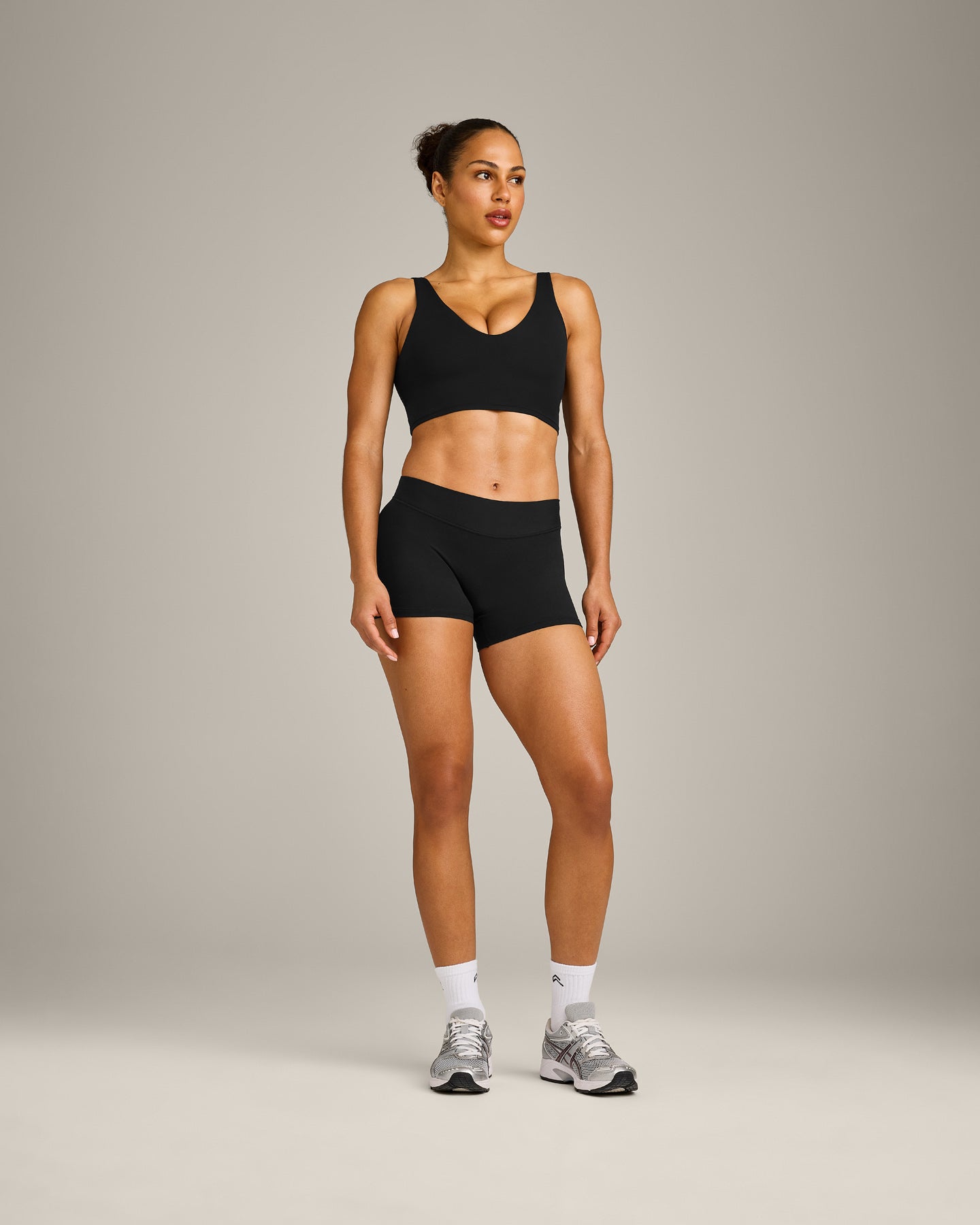 SoftMotion™ Longline Sports Bra with Gray Logo | Black