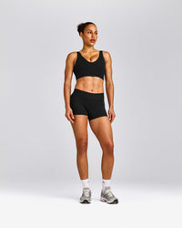 SoftMotion™ Longline Sports Bra with Gray Logo | Black