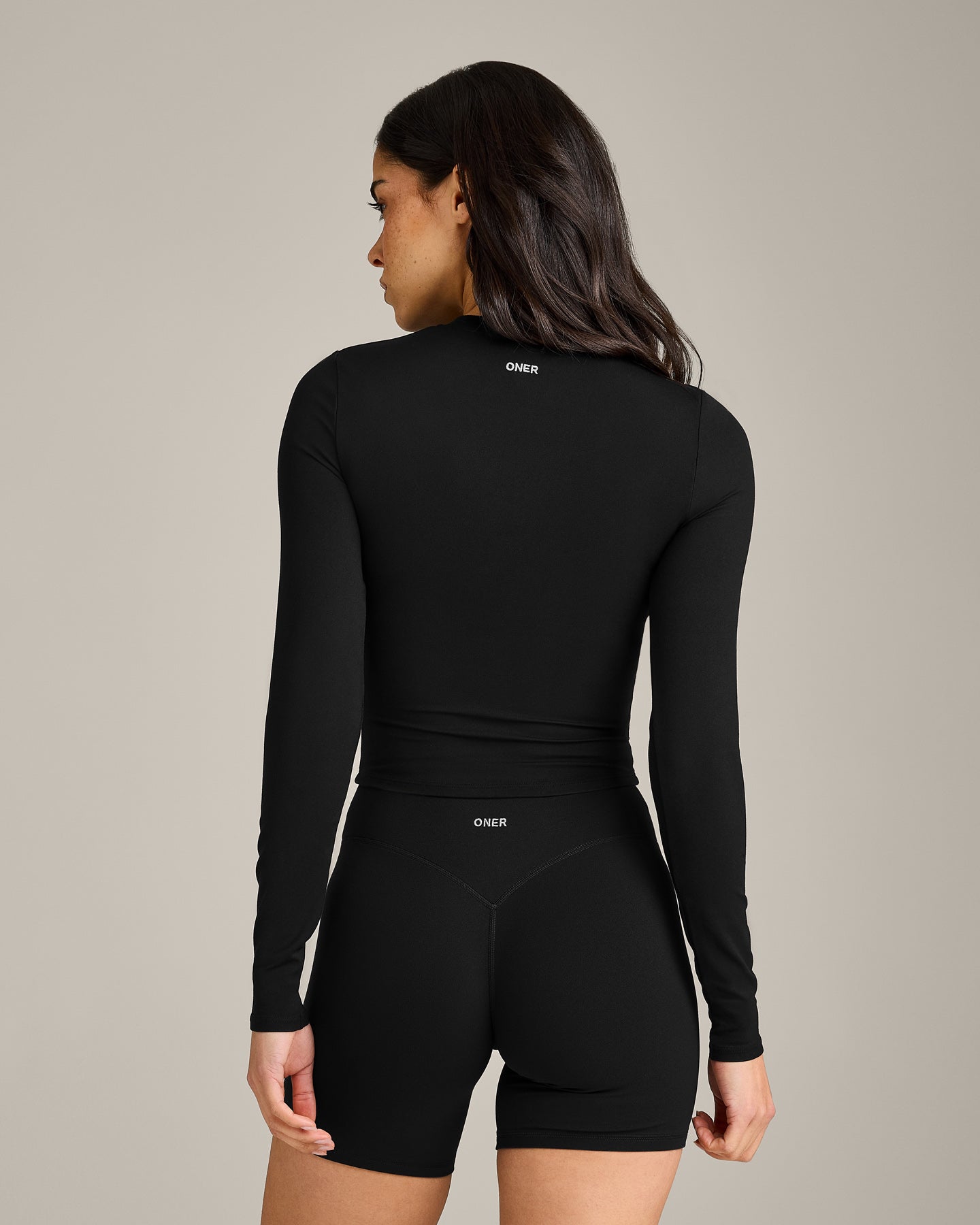 SoftMotion™ Long Sleeve Mid Top with Gray Logo | Black