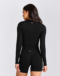 SoftMotion™ Long Sleeve Mid Top with Gray Logo | Black