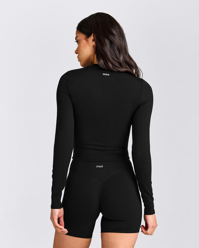 SoftMotion™ Long Sleeve Mid Top with Gray Logo | Black