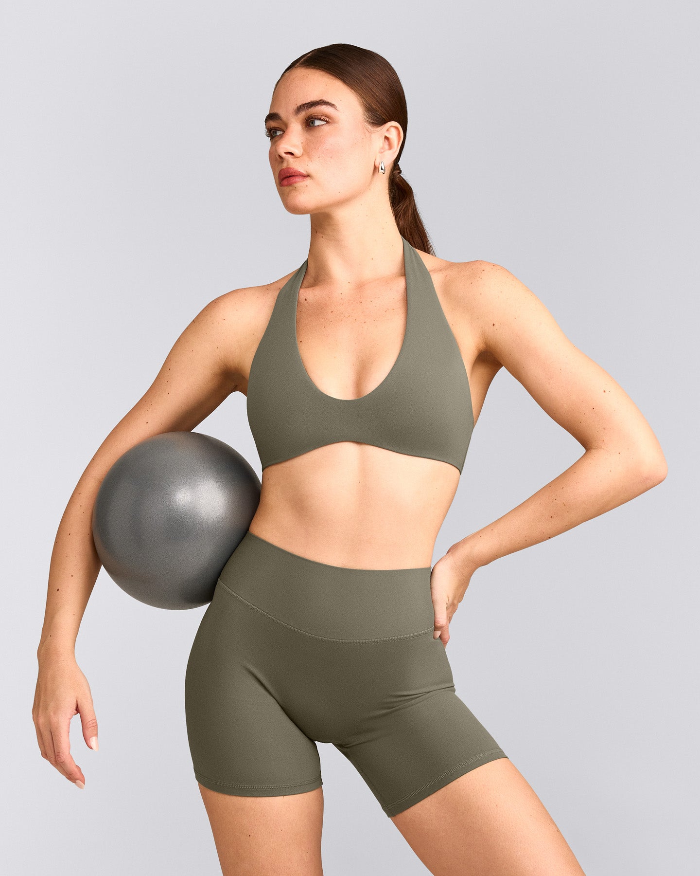 SoftMotion™ Minimal Halter Neck Bralette with Gray Logo | Alpine Green