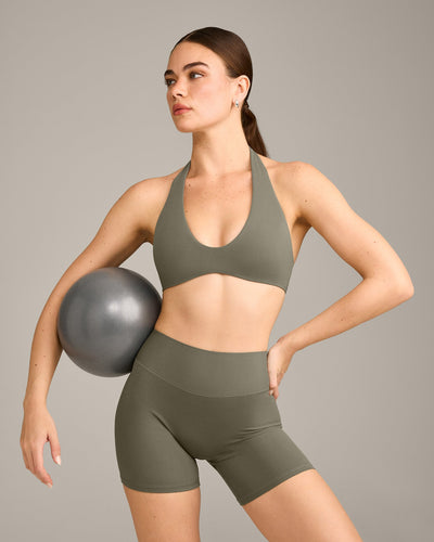 SoftMotion™ Minimal Halter Neck Bralette with Gray Logo | Alpine Green