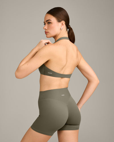 SoftMotion™ Minimal Halter Neck Bralette with Gray Logo | Alpine Green