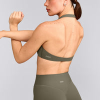 SoftMotion™ Minimal Halter Neck Bralette with Gray Logo | Alpine Green