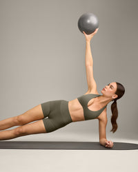 SoftMotion™ Minimal Halter Neck Bralette with Gray Logo | Alpine Green