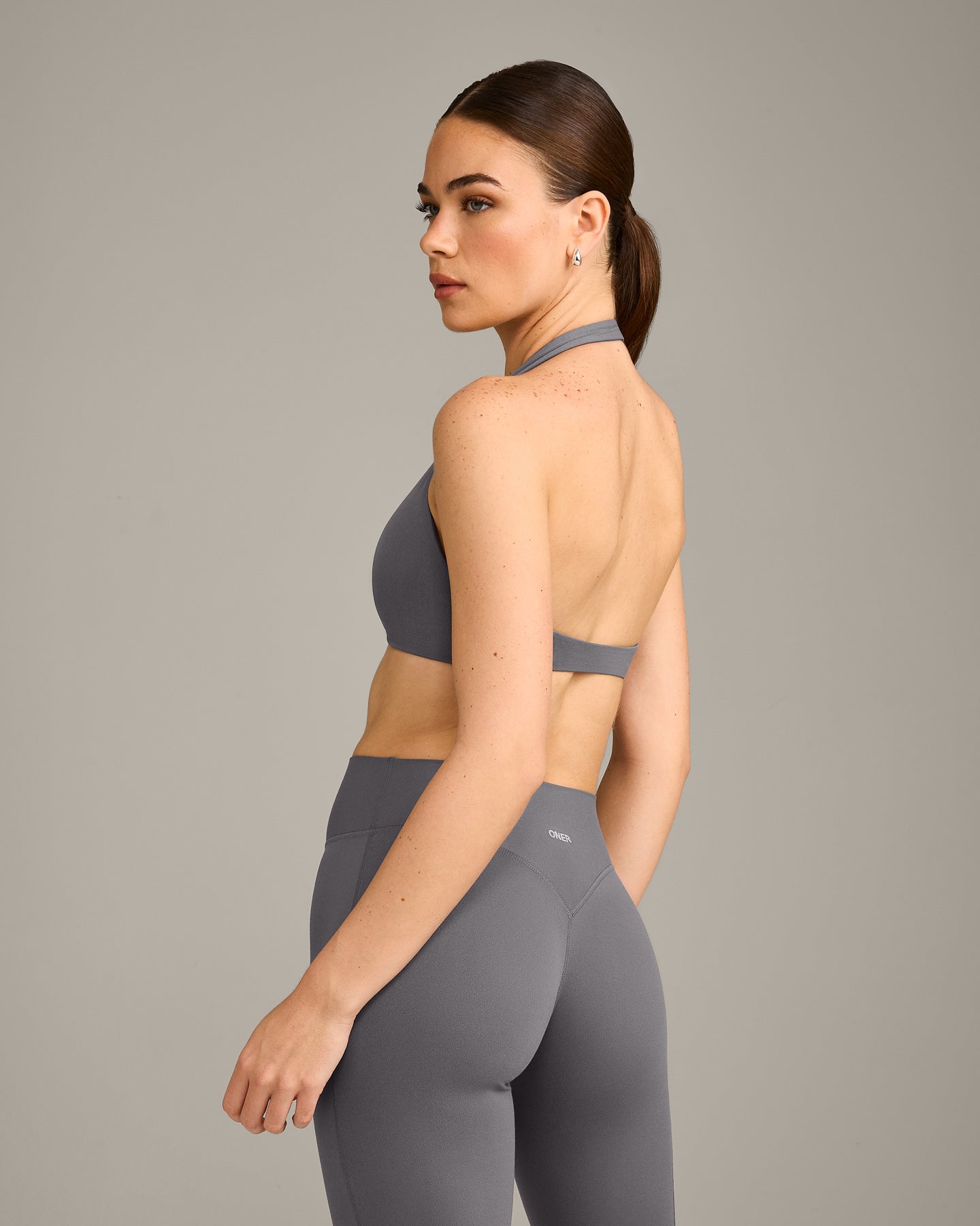 SoftMotion™ Minimal Halter Neck Bralette with Gray Logo | Ash Gray