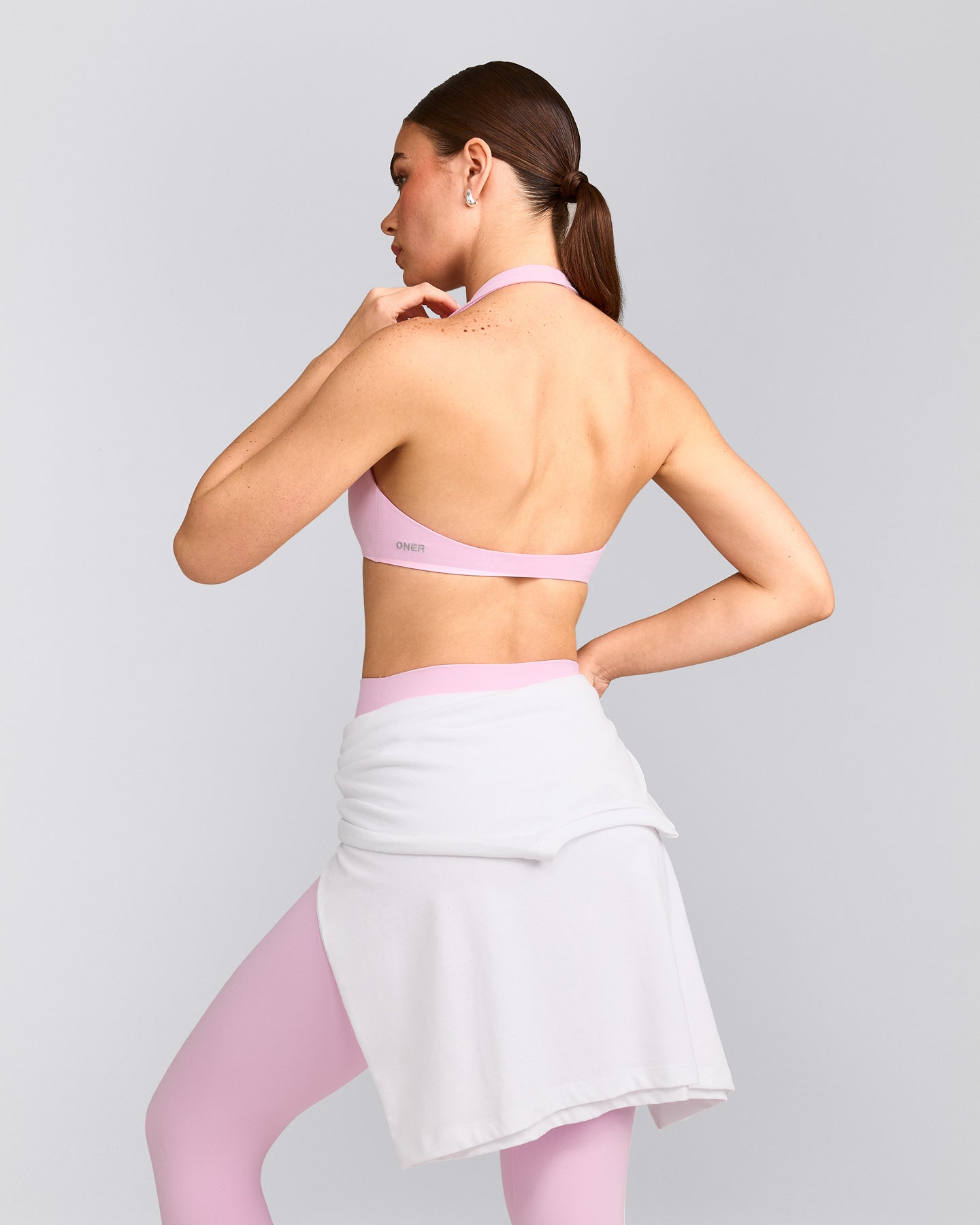 SoftMotion™ Minimal Halter Neck Bralette with Gray Logo | Chalk Pink