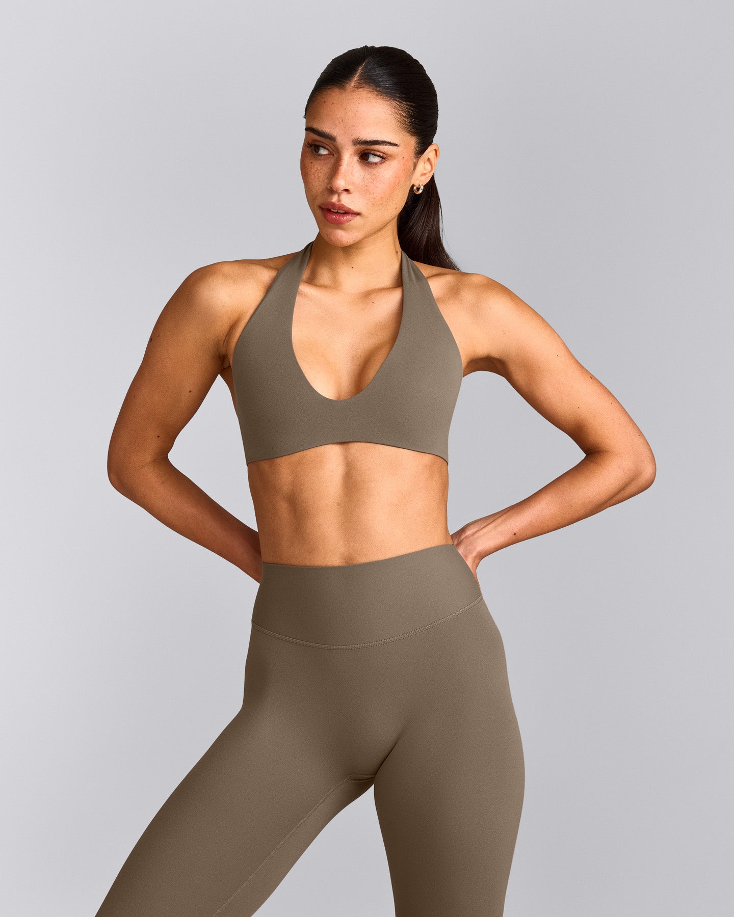 SoftMotion™ Minimal Halter Neck Bralette with Gray Logo | Moss Brown
