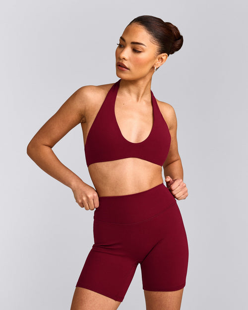 SoftMotion™ Minimal Halter Neck Bralette with Gray Logo | Ruby Red