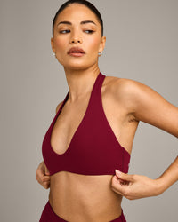 SoftMotion™ Minimal Halter Neck Bralette with Gray Logo | Ruby Red