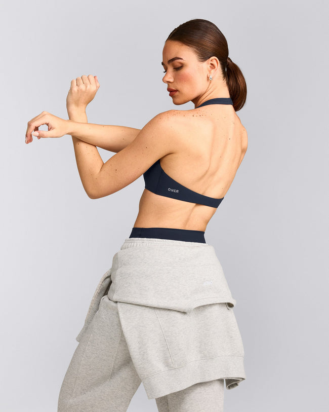 SoftMotion™ Minimal Halter Neck Bralette with Gray Logo | True Blue