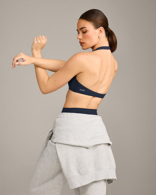 SoftMotion™ Minimal Halter Neck Bralette with Gray Logo | True Blue