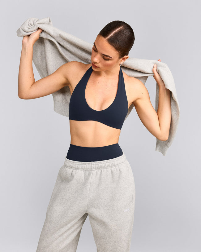 SoftMotion™ Minimal Halter Neck Bralette with Gray Logo | True Blue