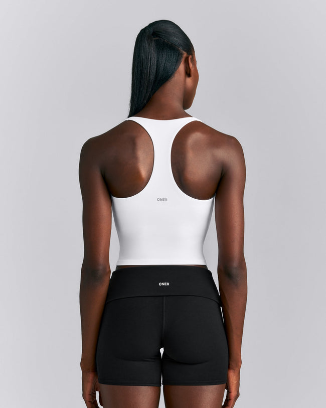 SoftMotion™ Racer Back Mid Tank Top with Built in Bra Shelf | White