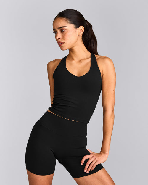 SoftMotion™ Racer Back Mid Tank Top with Built in Bra Shelf with Gray Logo | Black