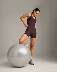 SoftMotion™ Racer Back Mid Vest with Built in Bra Shelf with Gray Logo | Plum Brown