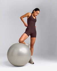 SoftMotion™ Racer Back Mid Tank Top with Built in Bra Shelf with Gray Logo | Plum Brown