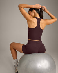 SoftMotion™ Racer Back Mid Vest with Built in Bra Shelf with Gray Logo | Plum Brown