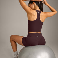 SoftMotion™ Racer Back Mid Vest with Built in Bra Shelf with Gray Logo | Plum Brown