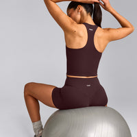 SoftMotion™ Racer Back Mid Tank Top with Built in Bra Shelf with Gray Logo | Plum Brown