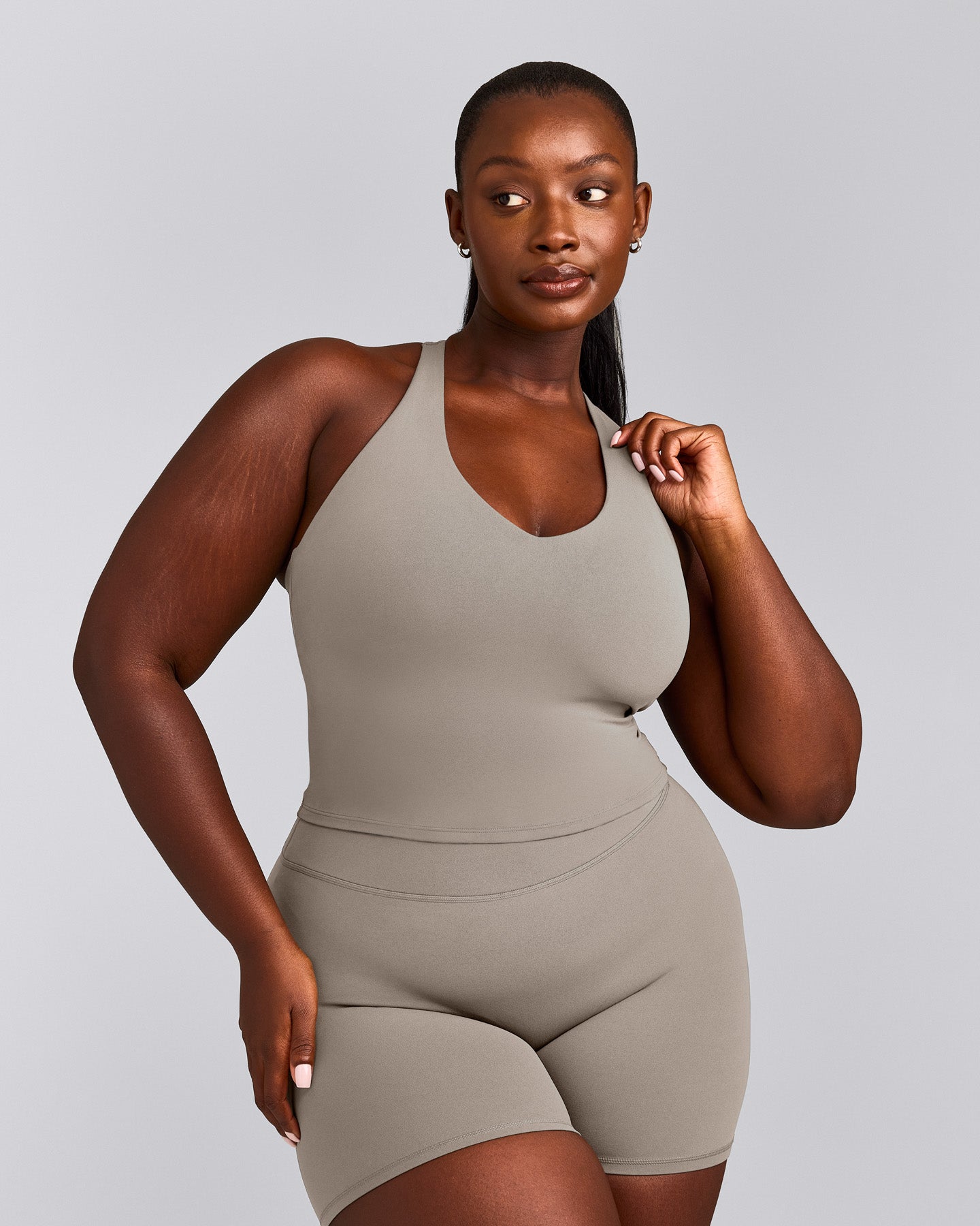 SoftMotion™ Racer Back Mid Tank Top with Built in Bra Shelf with White Logo | Warm Sand