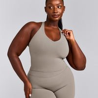 SoftMotion™ Racer Back Mid Tank Top with Built in Bra Shelf with White Logo | Warm Sand