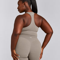 SoftMotion™ Racer Back Mid Tank Top with Built in Bra Shelf with White Logo | Warm Sand
