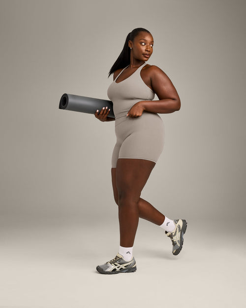 SoftMotion™ Racer Back Mid Tank Top with Built in Bra Shelf with White Logo | Warm Sand