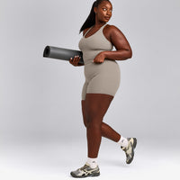 SoftMotion™ Racer Back Mid Tank Top with Built in Bra Shelf with White Logo | Warm Sand