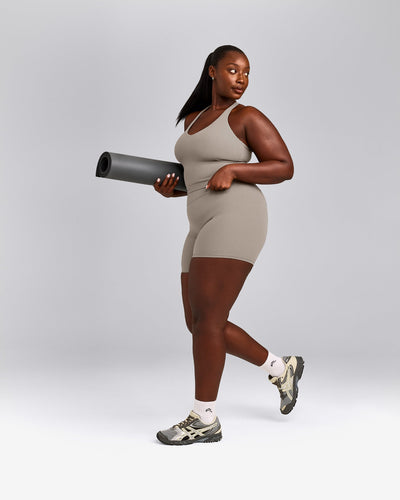 SoftMotion™ Racer Back Mid Tank Top with Built in Bra Shelf with White Logo | Warm Sand