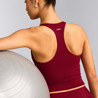 SoftMotion™ Racer Back Mid Tank Top with Built in Bra Shelf with Gray Logo | Ruby Red