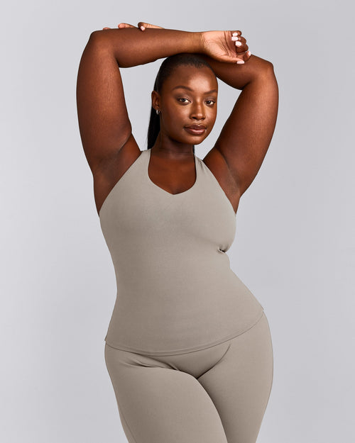 SoftMotion™ Racer Back Tank Top with Built in Bra Shelf with White Logo | Warm Sand