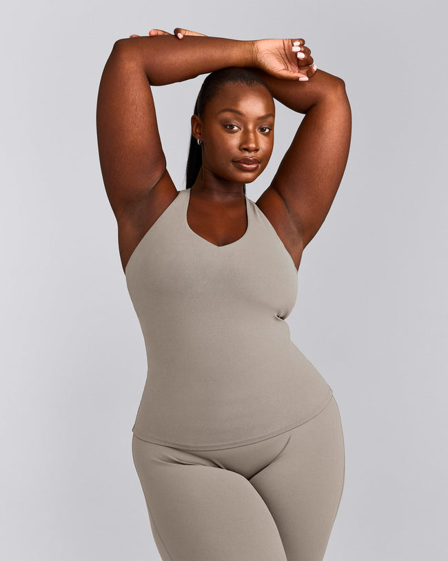 SoftMotion™ Racer Back Tank Top with Built in Bra Shelf with White Logo | Warm Sand