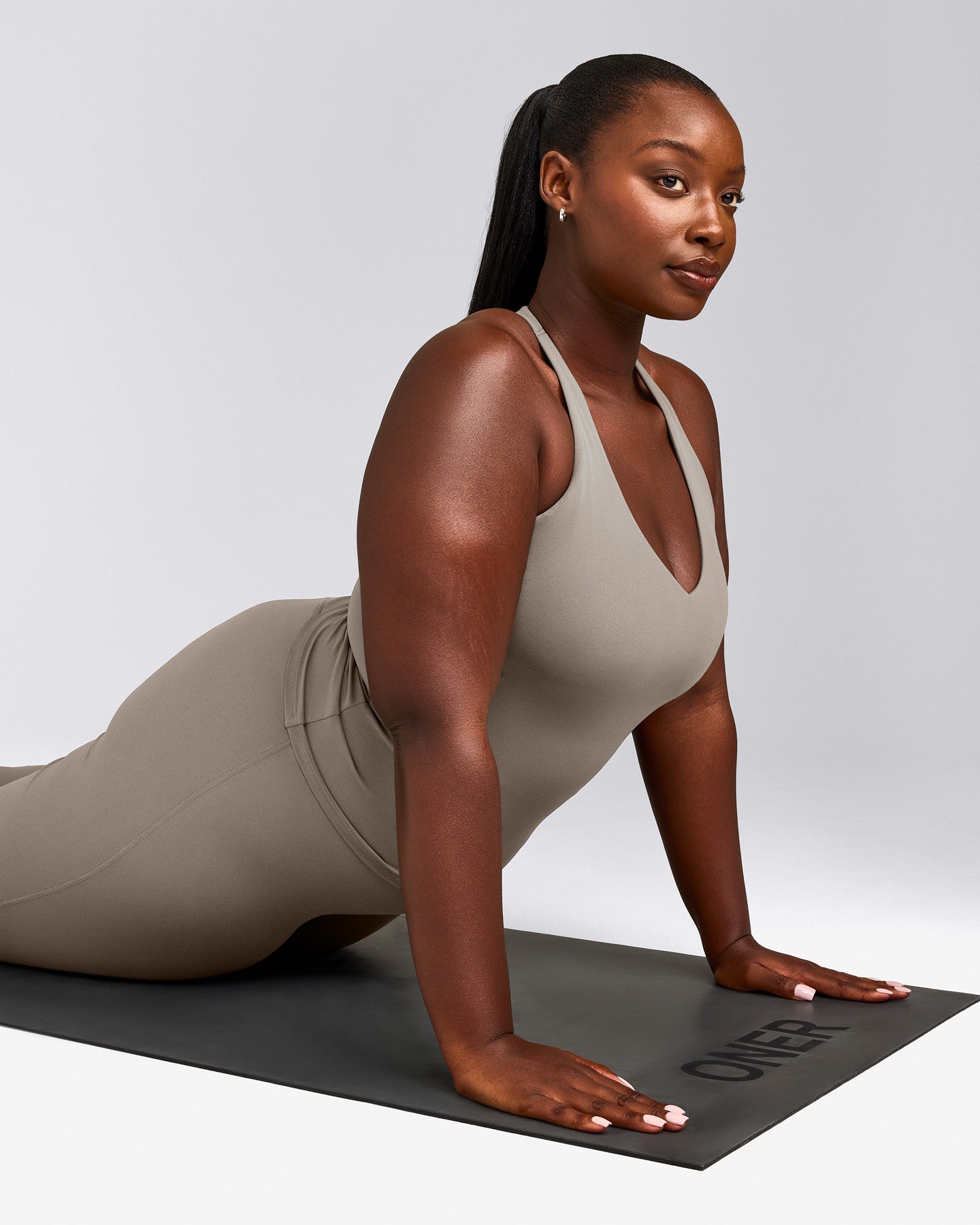 SoftMotion™ Racer Back Tank Top with Built in Bra Shelf with White Logo | Warm Sand