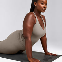 SoftMotion™ Racer Back Tank Top with Built in Bra Shelf with White Logo | Warm Sand