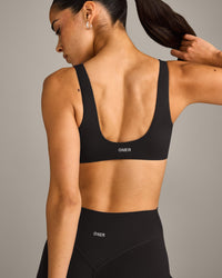 SoftMotion™ Scoop Back Bralette with Gray Logo | Black