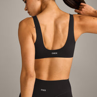 SoftMotion™ Scoop Back Bralette with Gray Logo | Black