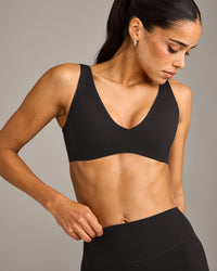 SoftMotion™ Scoop Back Bralette with Gray Logo | Black