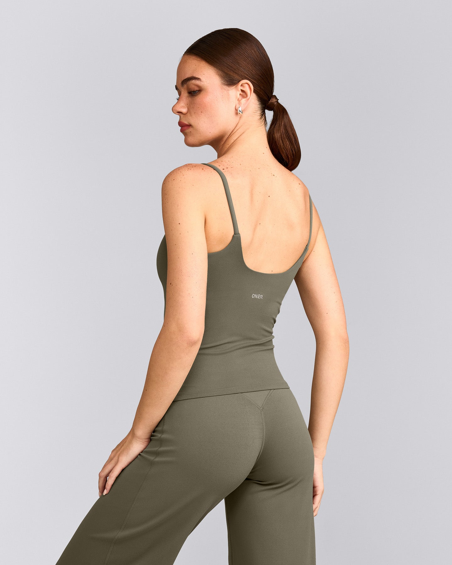 SoftMotion™ Strappy Tank Top with Built in Bra Shelf with Gray Logo | Alpine Green