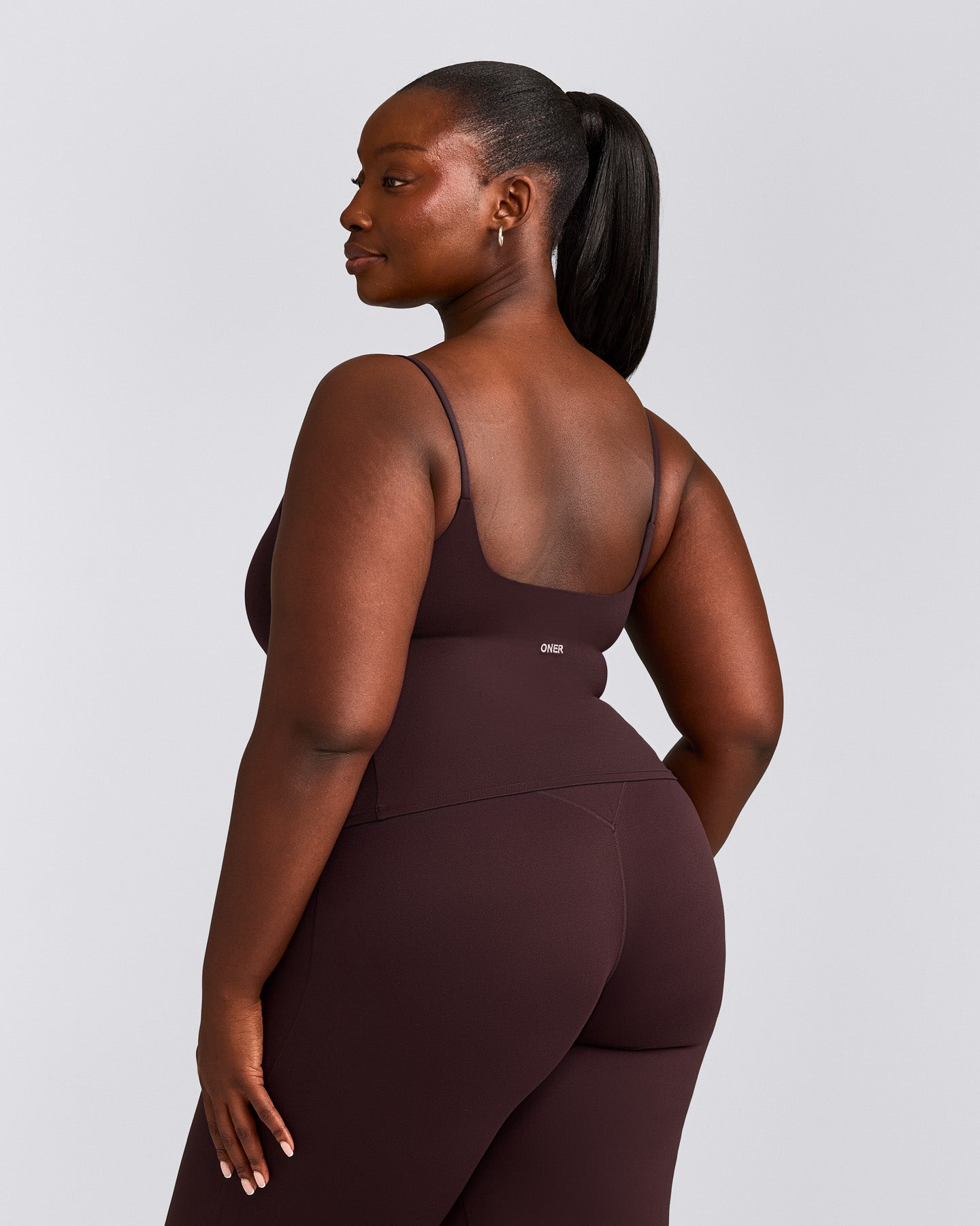 SoftMotion™ Strappy Mid Tank Top with Built in Bra Shelf with Gray Logo | Plum Brown