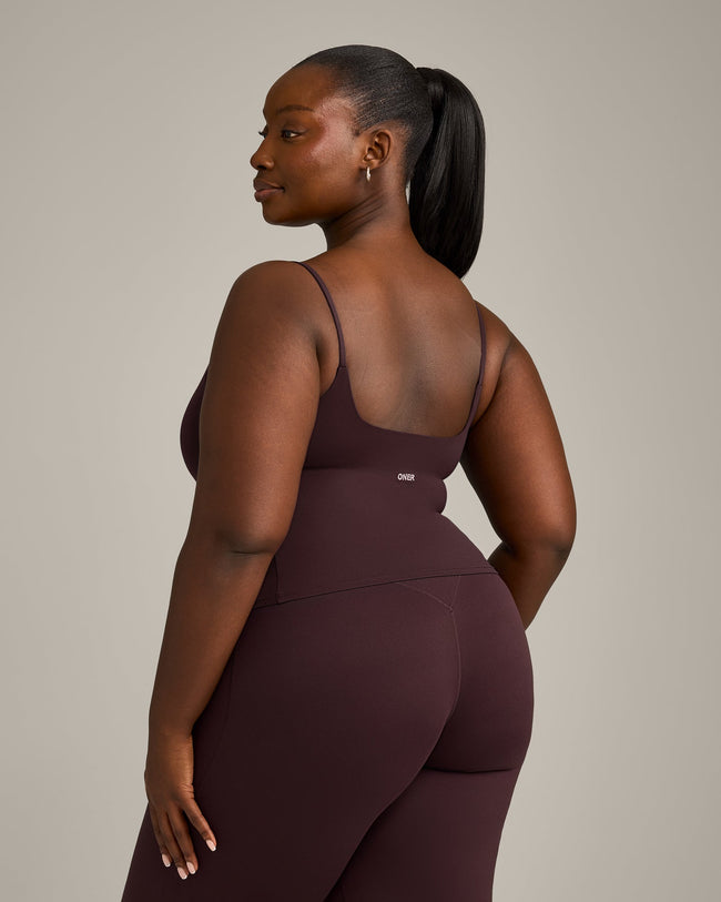 SoftMotion™ Strappy Mid Vest with Built in Bra Shelf with Gray Logo | Plum Brown