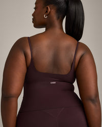 SoftMotion™ Strappy Mid Vest with Built in Bra Shelf with Gray Logo | Plum Brown