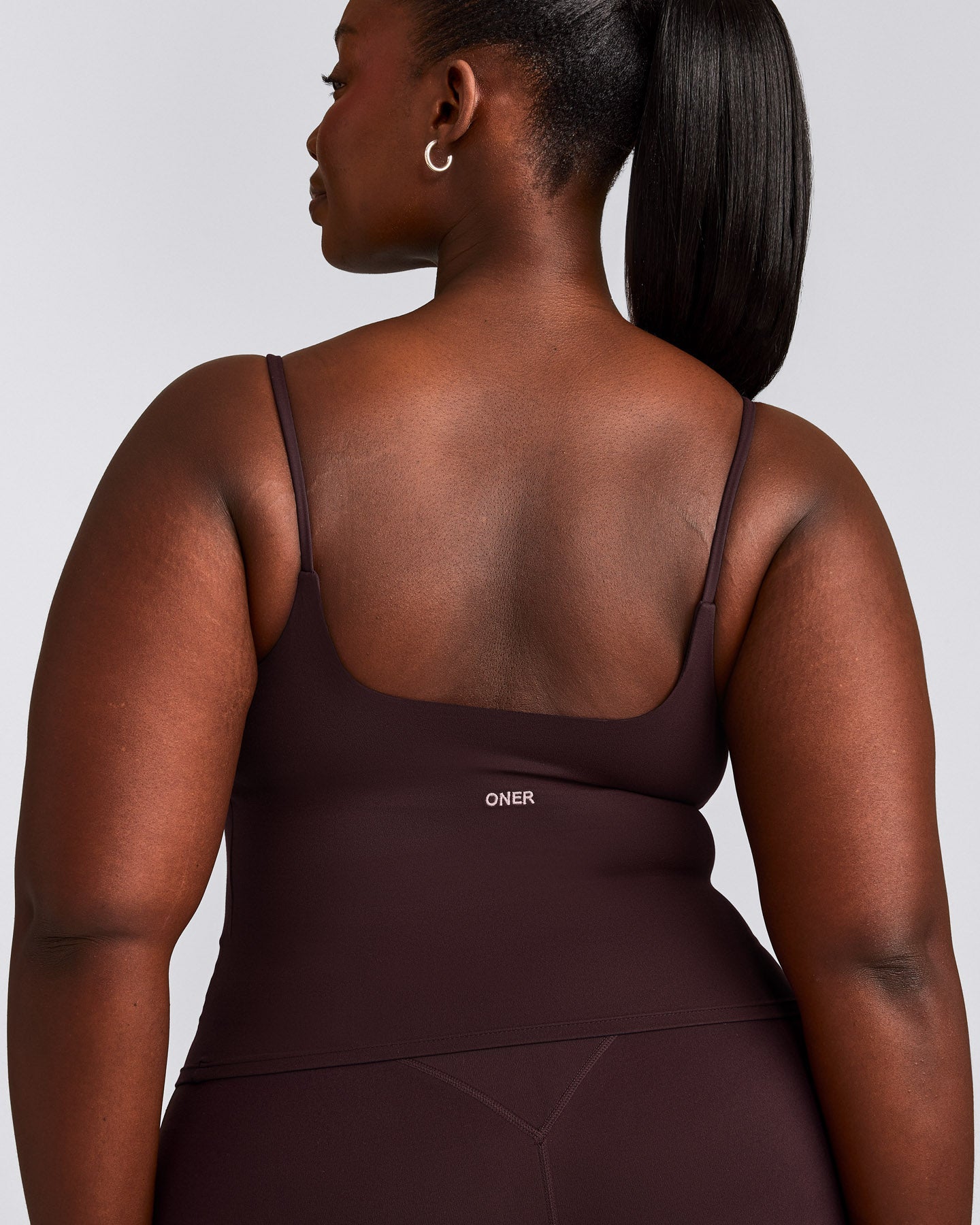 SoftMotion™ Strappy Mid Tank Top with Built in Bra Shelf with Gray Logo | Plum Brown
