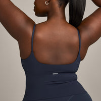 SoftMotion™ Strappy Mid Tank Top with Built in Bra Shelf with Gray Logo | True Blue